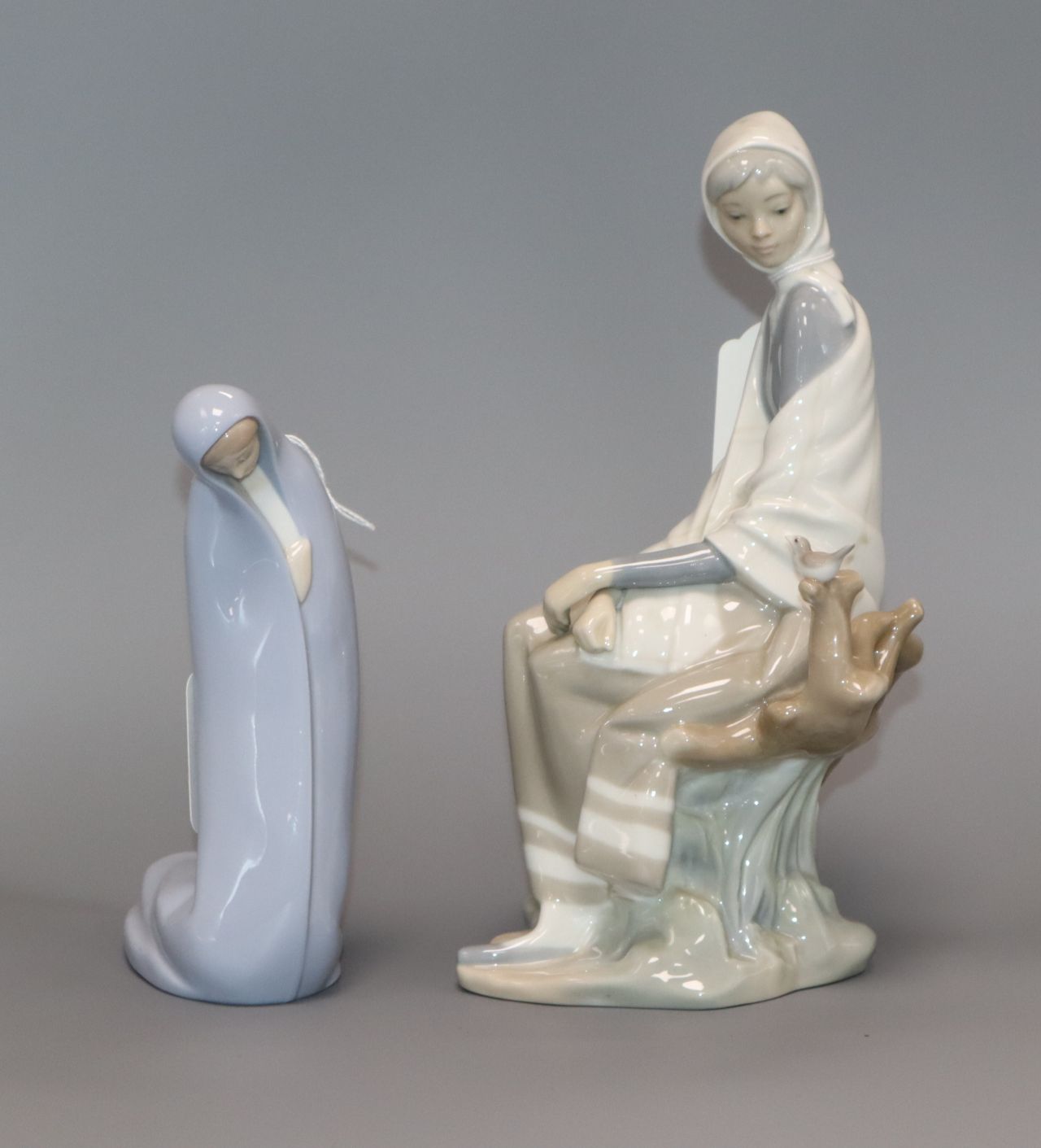 A Lladro figurine, 'New Shepherdess' and another, 'Kneeling Madonna'