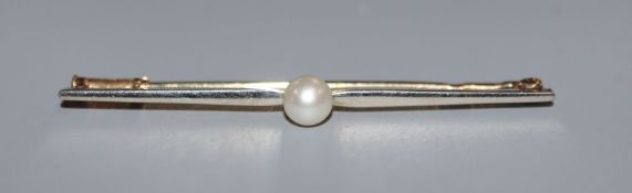 A Peter Carl Faberge two-colour bar brooch set with a single pearl, in a Faberge box, 50mm.