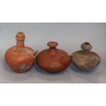 Three 19th century Indonesian pottery kendi