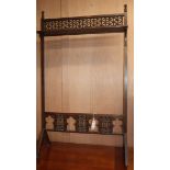 A Liberty & Co style oak firescreen frame W.70cm