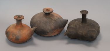 Three 19th century Indonesian pottery kendi