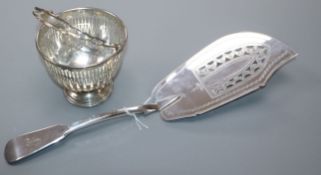 A George III silver fiddle pattern fish slice, London, 1812 and a pierced sterling small basket.