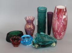 A Whitefriars style green textured cased glass vase and seven items of coloured glassware, including