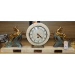 An Art Deco style onyx, marble and spelter mantel clock length 64cm