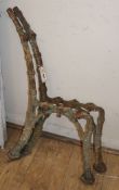 A pair of Victorian cast iron bench ends H.79cm