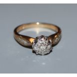 A 9ct gold diamond cluster ring, total diamond weight approximately 0.20cts, size K.