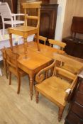 An early Victorian oak drop leaf table and six chairs W.104cm