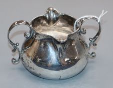 An unusual George II silver two handled double lipped cream jug by John Gamon, London, 1736,