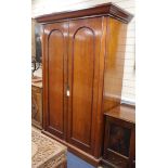 A Victorian wardrobe with interior fitments enclosed by a pair of doors W.136cm