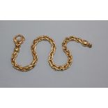 An 18ct gold Byzantine-link bracelet with trigger clasp, 23 grams, approx. 18.5cm.