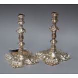 A pair of Georgian style cast silver tapersticks, London 1934, Garrard & Co (possibly