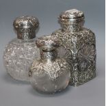 Three assorted Victorian/Edwardian silver mounted cut glass scent bottles by William Comyns &