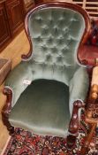 A Victorian buttonback armchair