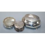 Three assorted early 20th century silver trinket boxes, including one with engraved lid, largest