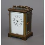 An early 20th century brass carriage timepiece