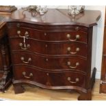 A George III style mahogany serpentine chest of drawers W.90cm