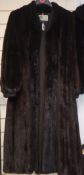 A dark brown mink full length coat by Ross Furryers Ltd