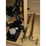 An angle poise lamp, a bakelite telephone and a brass towel rail (3)