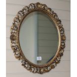 A 19th century oval Florentine gilt wall mirror H.66cm