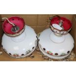 A pair of Victorian cranberry glass overlaid lustre lights