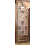 A 19th century French glazed arched door H. approx. 232cm
