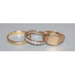 An 18ct yellow gold wedding band, a 9ct gold signet ring and a 9ct white gold and zircon eternity