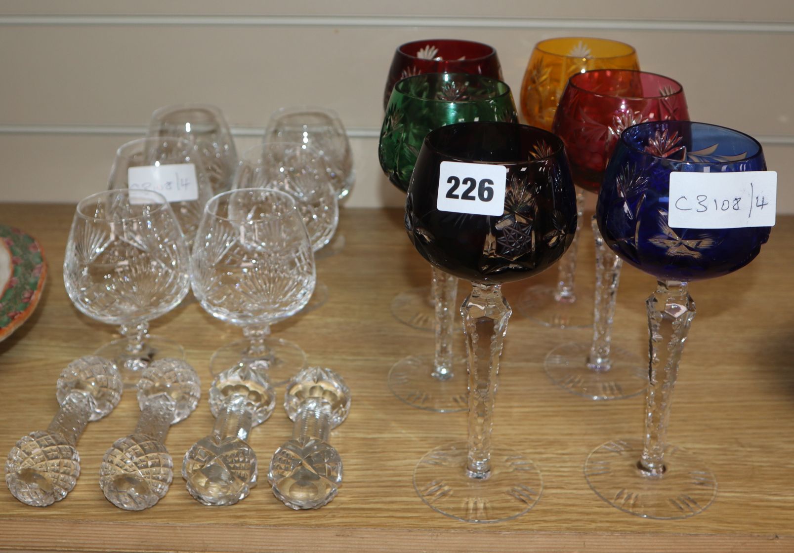 A set of six Bohemian hock glasses, six brandy glasses and four knife rests