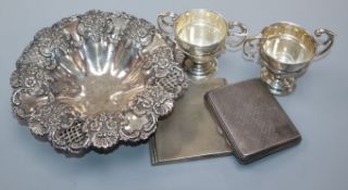 A late Victorian pierced silver dish, Birmingham, 1899, two small silver trophy cups and two