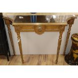 A reproduction gilt console table W.111cm