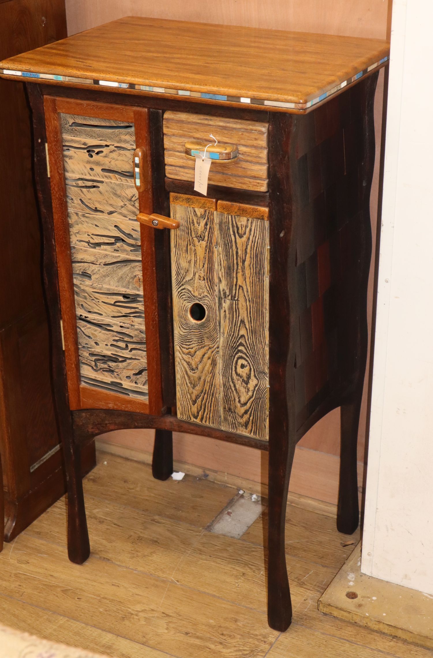 A contemporary painted wood side cabinet, monogrammed T.W. W.60cm