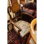 A late Victorian marquetry inlaid elbow chair