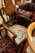 A late Victorian marquetry inlaid elbow chair