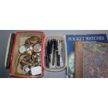 A 9ct. gold lady's watch, watch parts, pocket watch reference books and pens