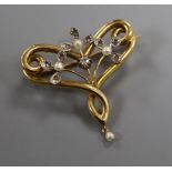 A yellow metal, diamond and seed pearl scrolled openwork brooch, with pearl drop, Tessier box,