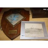 A ship's crest 'presented by The Lord Commissioner of The Admiralty to Shoreham-By-Sea to