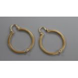A pair of yellow metal and diamond set hoop earrings, diameter 28mm.