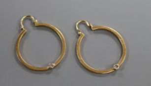 A pair of yellow metal and diamond set hoop earrings, diameter 28mm.