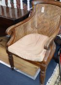 A William IV mahogany bergere library chair