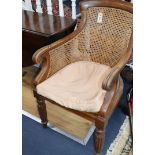 A William IV mahogany bergere library chair