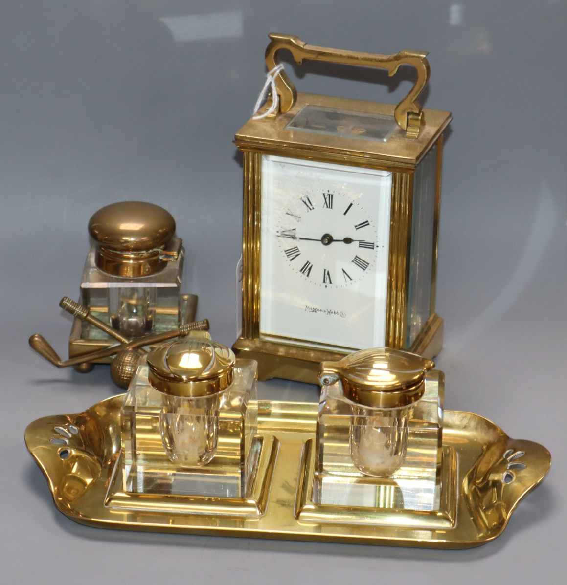 A novelty golfing brass inkwell, a two bottled inkwell and a Mappin & Webb timepiece, 11.5cm