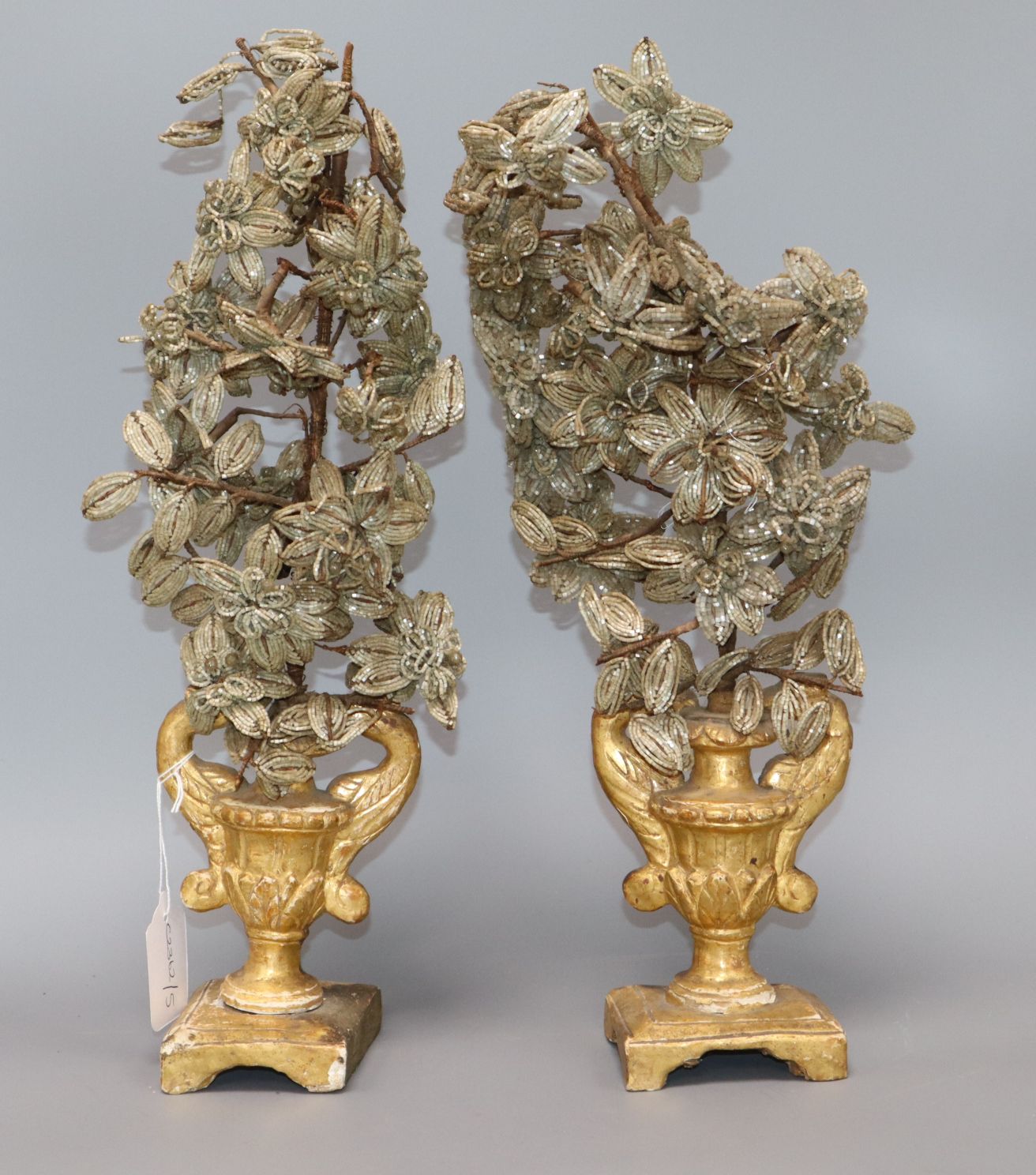 A pair of altar pieces height 43cm