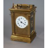 An early 20th century French brass eight day repeating carriage clock, retailed by Frodsham