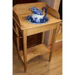 A Victorian pine washstand with later blue and white jug and basin W.62cm