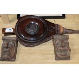 A 19th century set of mahogany bellows and a pair of carved corbels