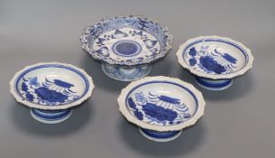 Four Chinese blue and white footed dishes largest diameter 20cm