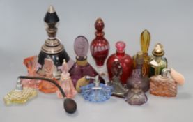 A collection of mostly coloured Art Deco perfume bottles and stoppers