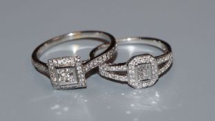 Two modern white metal and diamond set dress rings, including 18k round brilliant and square cut,