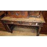 A late 19th century Flemish carved oak side table W.114cm