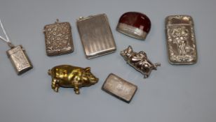 A small collection of eight assorted vesta cases including three silver, one white metal and four