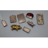 A small collection of eight assorted vesta cases including three silver, one white metal and four